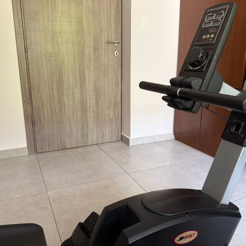X-FIT rowing machine used with magnetic resistance and LCD display