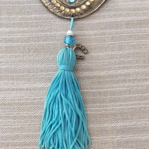 Ceramic gouria and metal eye charm set like new with blue beads and tassels