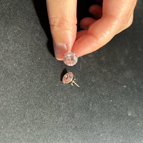 Earrings with pink rhinestones used