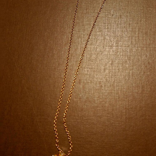 Folli Follie necklace like new, gold color with barrel and stones