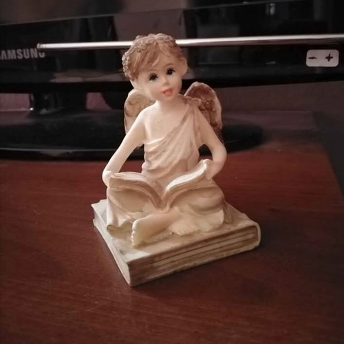 Angel figurine beige color like new