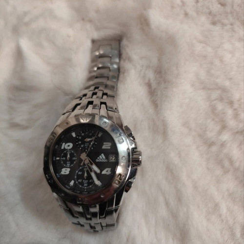Adidas wristwatch used, silver color