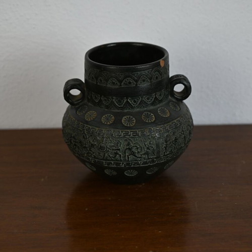 Decorative ceramic vase in ancient style with geometric motifs