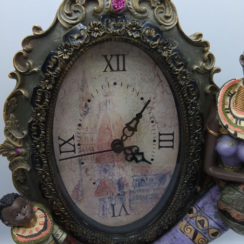 Table clock with African figures decoration, like new