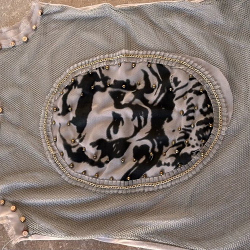 Women's sleeveless blouse gray like new, size small with studs and holes