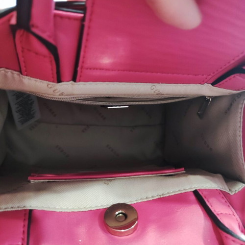 Guess handbag like new, fuchsia color with extra strap