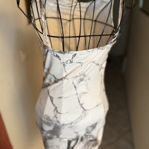 Mini dress with marble print like new, fitted with draped neckline