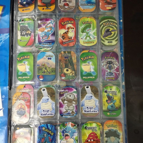 Pokémon album with metal tags used