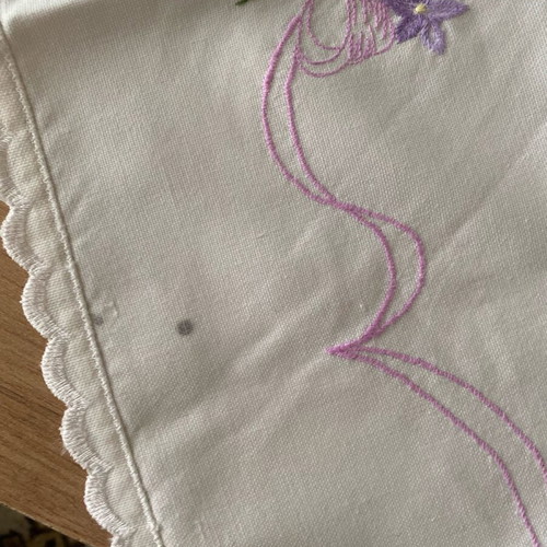Rectangular table cloth used, white with pink and purple flowers 80x80cm