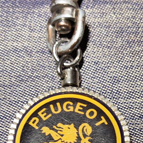 Peugeot vintage double-sided keychain used