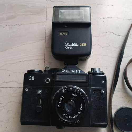 Vintage Zenit 11 camera like new with Industar-50-2 lens and Starblitz flash