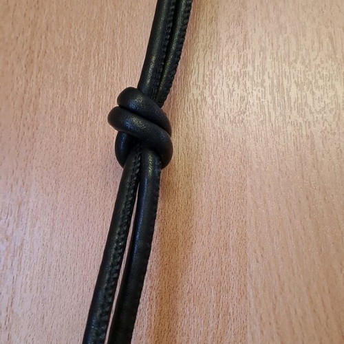 Dkny black leather crossbody bag like new with knot design strap