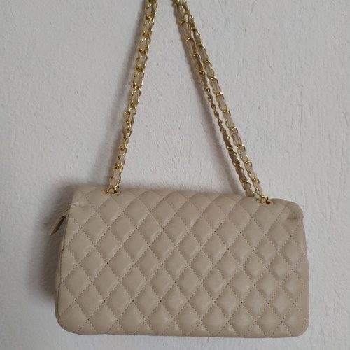 Women's beige handheld bag unused