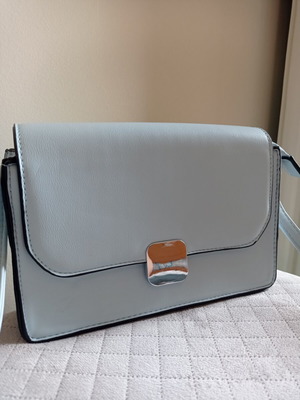Crossbody bag turquoise like new with silver details