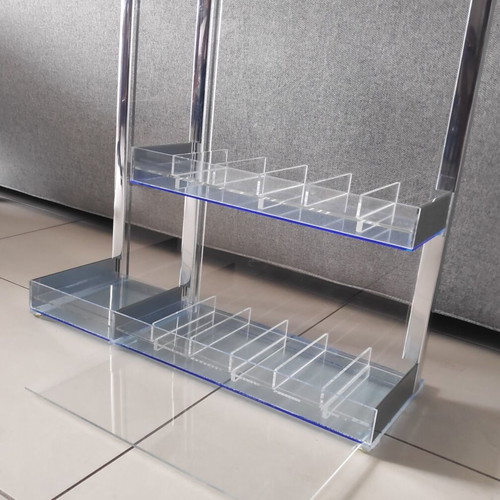 Tabletop plexiglass product display stand like new with metal decorations
