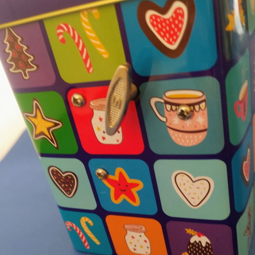 Christmas music box with winding key and festive designs