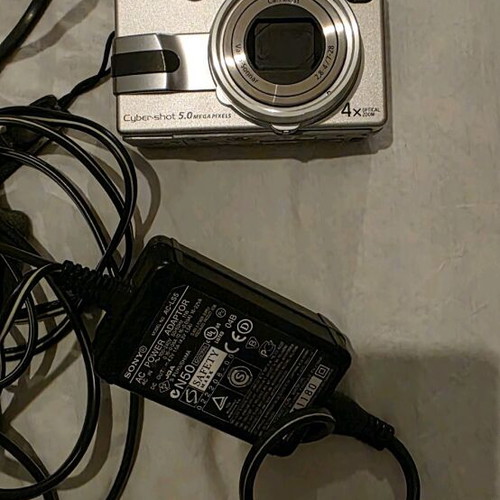 Sony V1 camera refurbished, for parts with charger