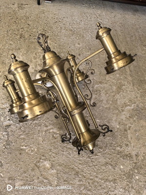Brass chandelier used with artistic base