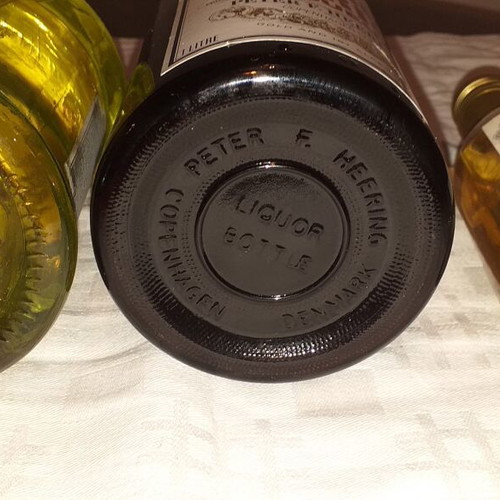 Old wine set with 2 sealed bottles Cherry Heering and Kumquat plus 185 ml Carlhamns Punsch