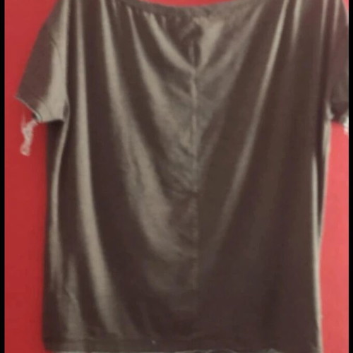 Top khaki with frayed edges and studs like new, size medium/large