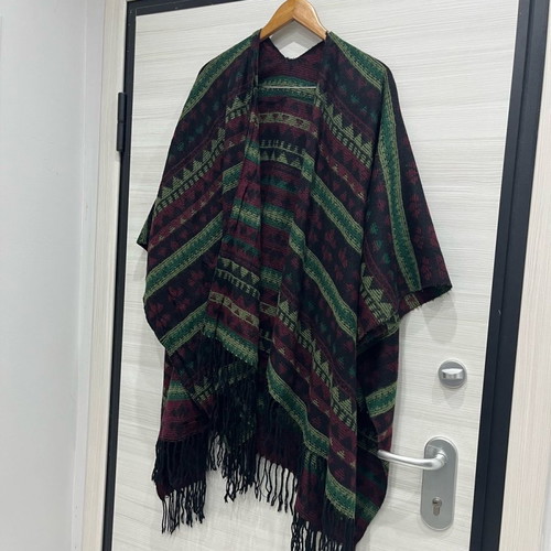 Women's wool cape used with multicolor pattern