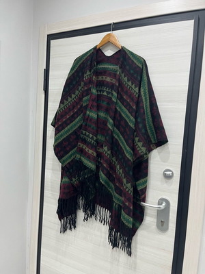 Women's wool cape used with multicolor pattern