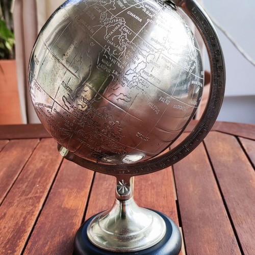 Decorative metal globe with wooden base like new