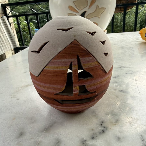 Handmade ceramic lantern with sailboat design, tealight holder