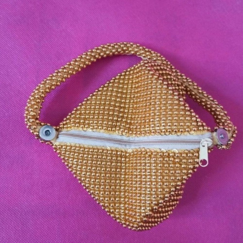 Mini pearl purse like new, gold, clip clasp and zipper