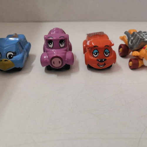 Small animal figures with wheels like new