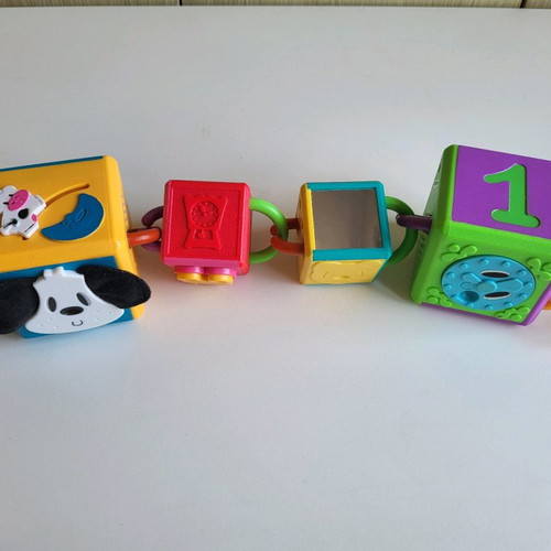 4 Hasbro Chain Cubes used, educational toy