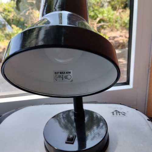 Black table lamp with flexible neck and bulb