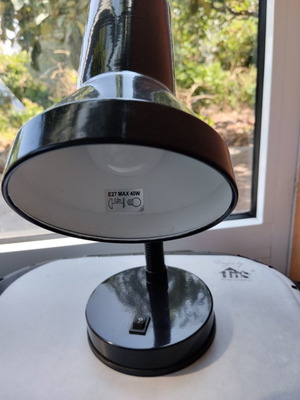 Black table lamp with flexible neck and bulb