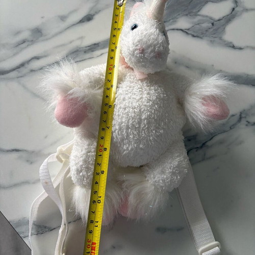 Children's plush unicorn backpack used in excellent condition