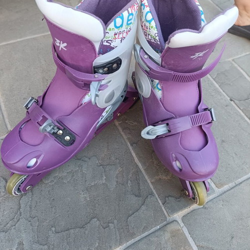 Women's rollers size 38-41 like new with helmet light and pads