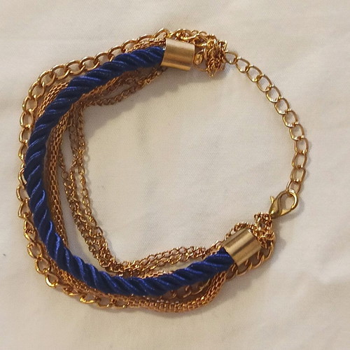 Women's bracelet with blue cord and gold chains, new