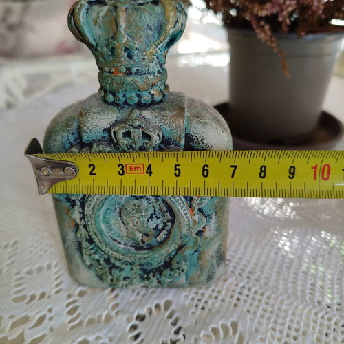 Handmade decorative bottle like new with mixed media and verdigris patina