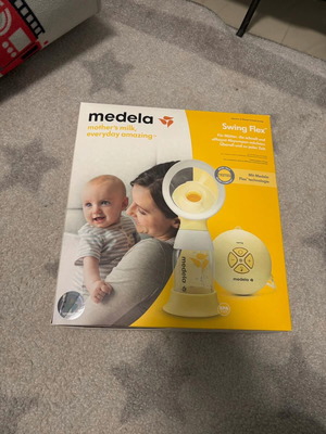 Medela electric breast pump used with all accessories