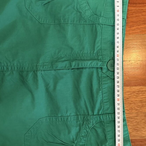 Set of 3 pieces like new, white semize shirt with letters, green skirt, fuchsia belt