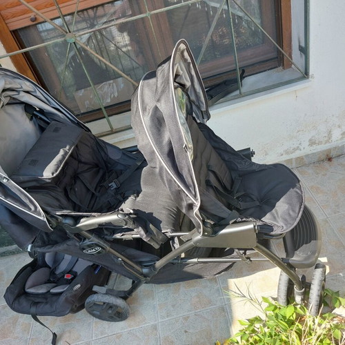 Twin stroller with one car seat