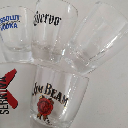 Set of 5 used glass shot glasses with liquor logos
