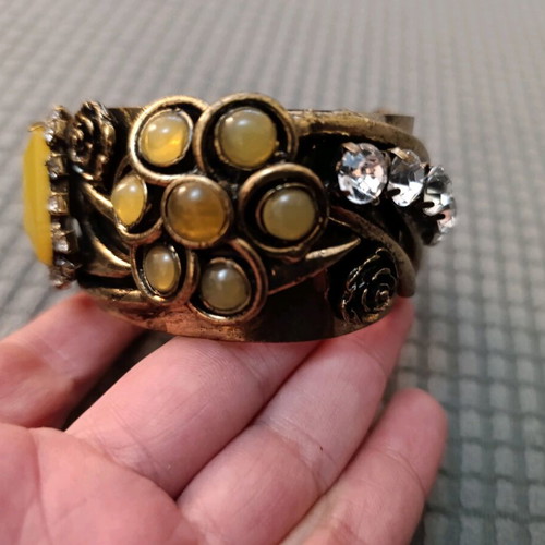 Vintage bracelet used in bronze, green and mustard shades
