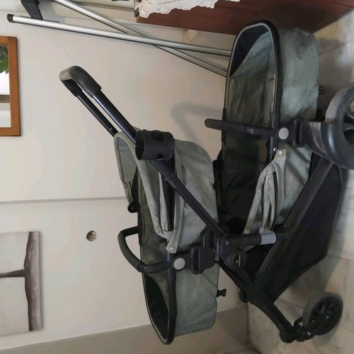 Twin stroller like new with footmuffs and carrycots