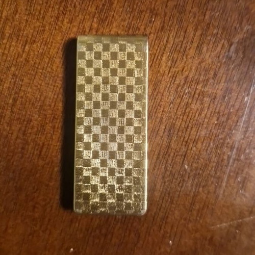 Money clip like new, gold color