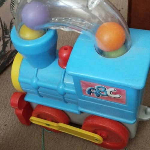 Children's train toy used, large with balls
