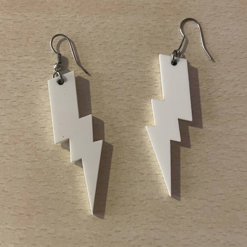 Lightning-shaped earrings like new, white