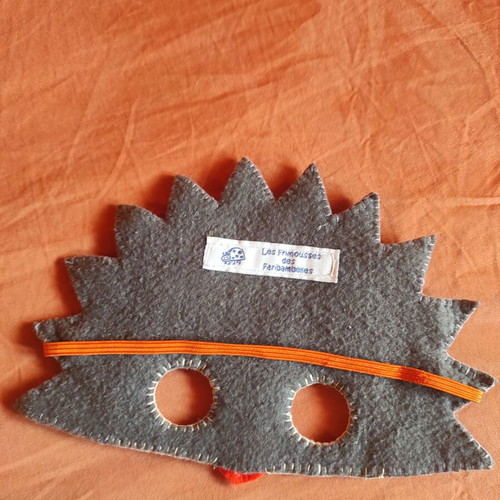 Handmade hedgehog mask used, felt with beads