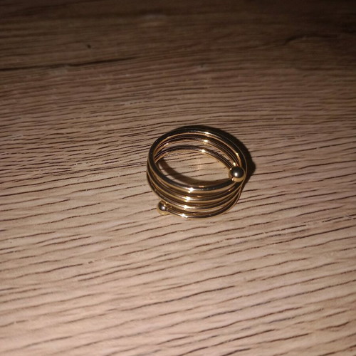 Spiral ring new, gold color
