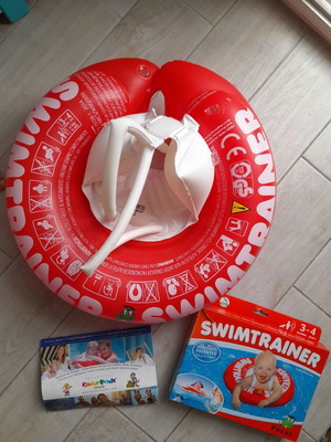 SwimTrainer Red flotation device like new, for 0-4 years