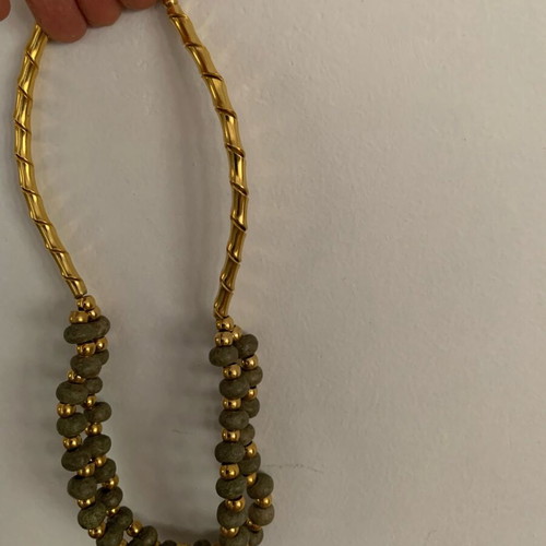 Necklace with khaki stone and gold used